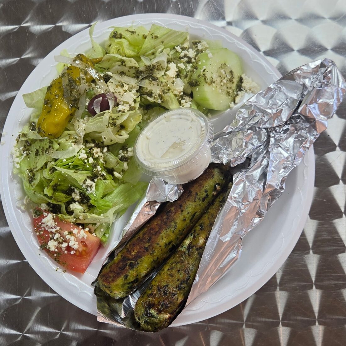 Niko's — (2) Chicken, souvlaki seasoned with fresh Spinach and Feta sausages on skewers